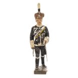 A Lineol figure of General Von Mackensen. In full dress Hussar uniform, shako with death’s head