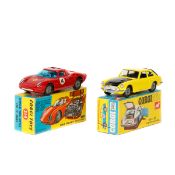 2 Corgi Toys. A MGC G.T. Competition Model (345). In bright yellow with black bonnet and boot lid,