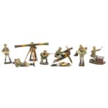 9 Elastolin German Army figures. 2 with range finders, large and small, soldier with wounded
