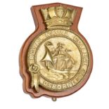 A cast brass official badge of the R. Naval College, Osborne, Isle of Wight, 1903-21, showing an