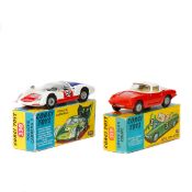 2 Corgi Toys. Lotus Elan Coupe (319). In bright red with white roof and interior, cast wheels and