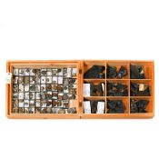 A wooden museum storage box containing two trays of fossils. Including specimens of Plants from