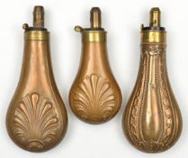 A copper powder flask, embossed rope and chain panels, common brass top, 3 position charger marked