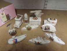 9 pieces of crested china, including Willow Art ambulance, arms of Blackpool, Savoy China field gun,