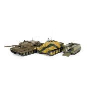 15 kit-built military vehicles in approximately 1:32 scale. Highly detailed plastic models built