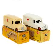 2 Dinky Toys Daimler Ambulance (253). Two different issues - cream with red wheels and a later gloss