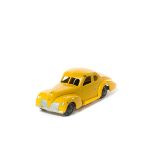 A scarce late 1930s Dinky Toys Studebaker (39f). A seldom seen example in bright yellow with a light