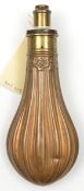 A copper powder flask “Fluted” (Riling 289) patent brass top by G & J W Hawksley, Sheffield,