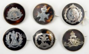 6 HM silver on tortoiseshell roundel sweetheart brooches, RA, Geo V RE, S Lancs Regt, KRRC, Camerons