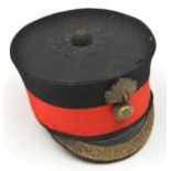 A Vic officer’s peaked forage cap of The Royal Fusiliers, blue cloth, scarlet headband, gilt