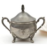 A Third Reich period silver plated white metal sugar bowl with lid, bearing the device of the