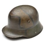 A German M16 steel helmet, the skull camouflage painted at a later date, with worn leather lining.