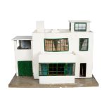 A Tri-ang Art Deco Doll's House (No.52 3138). From the Tri-ang 'Ultra-Modern' range of houses this