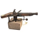 A 19th century flintlock alarm gun, constructed from part of a late 18th century Potsdam musket, 19”
