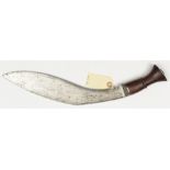 A kukri, blade 12” with narrow back fuller, marked at forte “Guaranteed Best Steel”, iron mounted