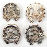 4 R Artillery silver sweetheart brooches, each featuring variations of the regimental badge and