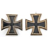 A 1939 Iron Cross 1st Class, of one piece construction with flat tapered pin; and a 1939 Iron