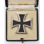A 1939 Iron Cross 1st class, with ferrous centre, the pin stamped “65” (Klein & Quenzer), in its