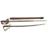 An Ed VII 1897 pattern infantry officer’s sword, in shortened scabbard, and a German infantry sword,