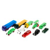 10 well restored Dinky Toys. Foden flatbed, Foden wagon, half cab bus, Austin Taxi, Studebaker