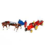 A Britains horse drawn milk float (131F) comprising of a blue cart with red wheel and horse.