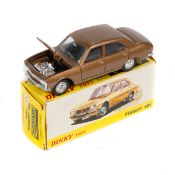 French Dinky Toys Peugeot 504 (1452). A Spanish issue. In metallic bronze, with black interior.