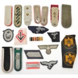 A small quantity of Third Reich cloth insignia, including 9 epaulettes, 2 collar patches, a