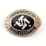 A small black enamel on silver Third Reich SS helper’s pin back badge, bearing the legend “Dank