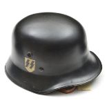 A post war German light weight police helmet, the lining with top pad bearing “Erel” trade mark of