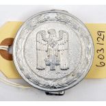 A Third Reich 1938 pattern Red Cross officer’s aluminium belt buckle, the back stamped “Ges.Gesch”