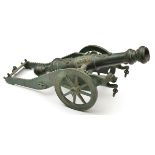 A decorative cast brass model of an Indian cannon, in the style of the 18th century, barrel 17½”