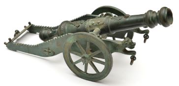 A decorative cast brass model of an Indian cannon, in the style of the 18th century, barrel 17½”