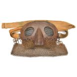 A WWI tank crew mask, with leather covered steel vizor, chain link lower guard,securing ribbons.