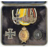 An interesting set of WWI German awards to a naval pilot in the airship service and group of three