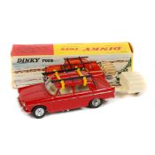 French Dinky Toys 404 Peugeot a toit ouvrant (536). In red with ivory interior and spun wheels.