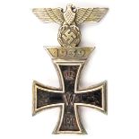 A 1914 Iron Cross 1st Class, with ferrous centre and integral 1939 clasp, the pin, which is hinged