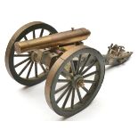 A well detailed brass and wooden scale model of a 25 shot cannon, 5x5 small bores with lift out