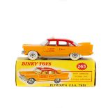 Dinky Toys Plymouth USA Taxi (265). In deep yellow with red roof, TAXI sign to roof, off white