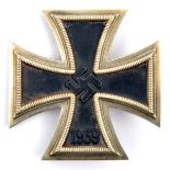 A 1939 Iron Cross 1st class, with ferrous centre. GC (the hinge pin loose).