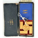 A good Third Reich SS 25 year Long Service award, in its original box with ribbon, the lid with