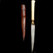 An Indian dagger kard. Late 19th century, straight single edge wootz blade 14cms, gilt stepped
