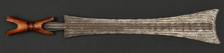 An African (Cameroon Grasslands area) dress knife. c.1900, broad swollen DE blade 43cms swollen