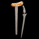 A Balinese dagger kris. Straight blade 40cms with distinctive pamor, silver hilt embossed as Bima,