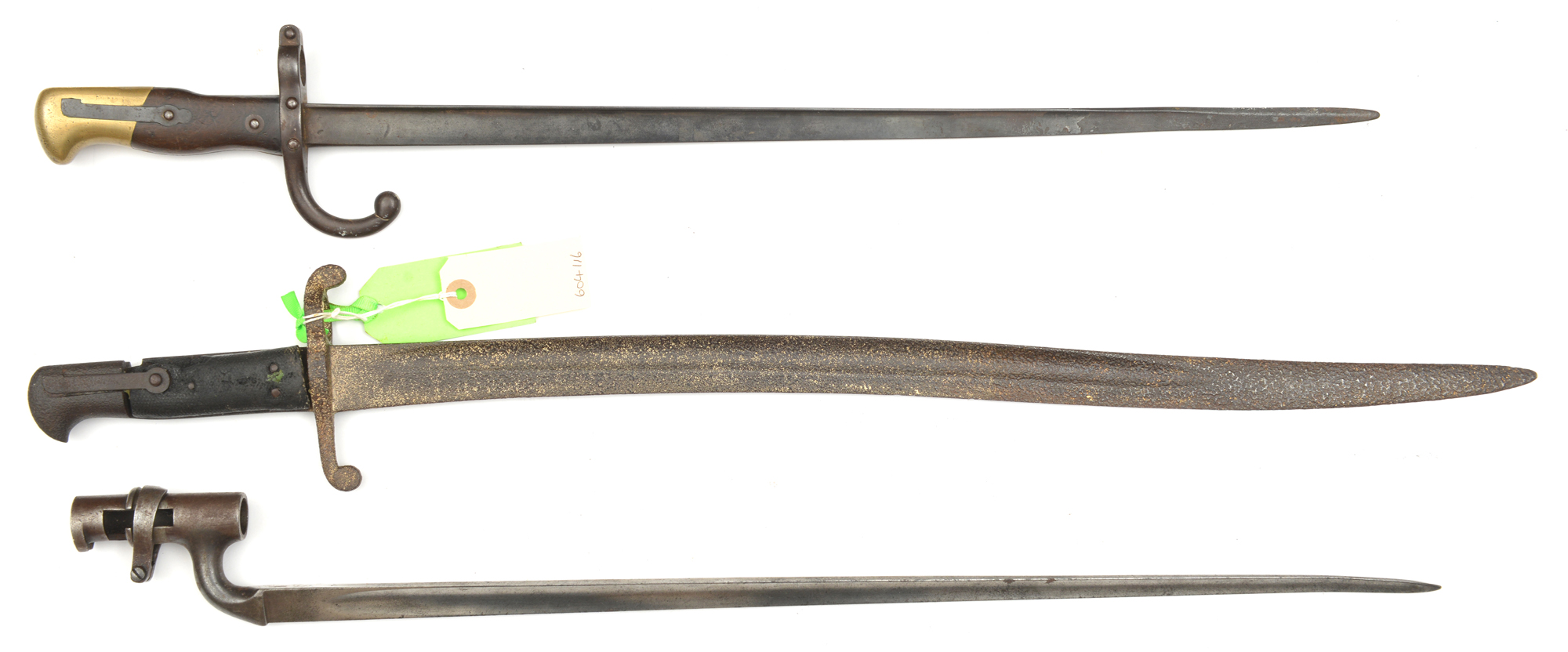 A Gras bayonet, d 1878 on backstrap and a P1876 socket bayonet for Martini Henry rifle, with