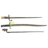 A Gras bayonet, d 1878 on backstrap and a P1876 socket bayonet for Martini Henry rifle, with