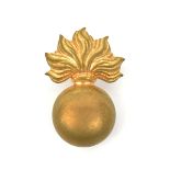 An OR’s brass grenade cap badge of The R. Marines Artillery. GC Plate 7
