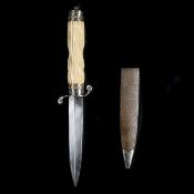 A hunting knife c.1900. Possibly Swedish, straight SE blade 12cms, casein grip imitating engine