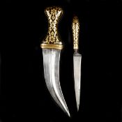A rare Arab dagger jambiya and matching kard. Probably Hyderabad c.1900, each with dark brown