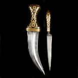 A rare Arab dagger jambiya and matching kard. Probably Hyderabad c.1900, each with dark brown