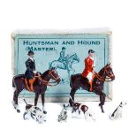 A rare small Britains set- Huntsmen and Hound (Master) No.1235. Mounted male and female figures,
